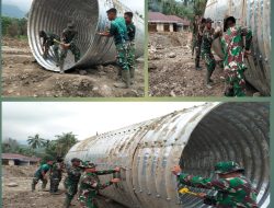 Personil Kodim 0307/TD Bersinergi Bangun Jembatan Aramco di Batipuh Selatan